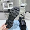 sy_no_CBE74BEF0A80EACA11D3EC219F2ED384_8 Prada Black Woven Roman Gear Platform Sandal