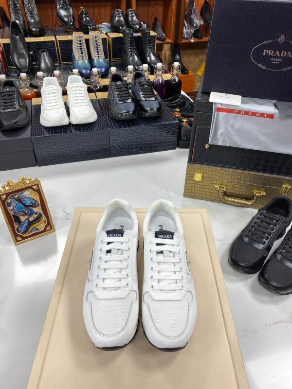 sy_no_CC93027CCC24BD9EB1C3D07F0C664549_0 Prada White Mesh Leather Triangle Trainer