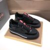 sy_no_CE1D3197B403FF3C2CA06A4D1C72B2FB_1 Prada Black Patent Mesh Red Tongue Platform Sneaker