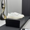 sy_no_CE5D2E55822990B676095A7E5E3D561A_1 Chanel White Leather Platform Low-Top Sneaker with Gold CC Charm
