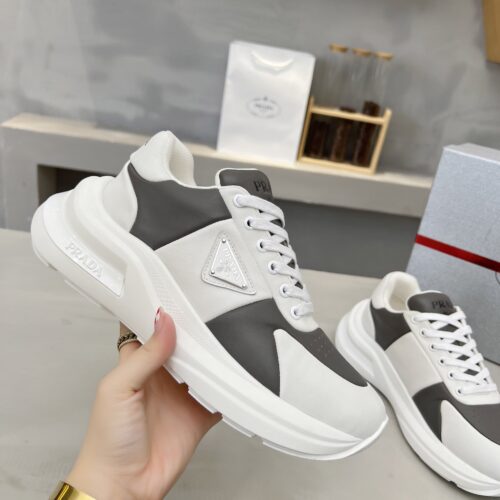 sy_no_D1F6D8B9B16A922686241214F2473B24_0 Prada Grey White Triangle Logo Platform Sneaker