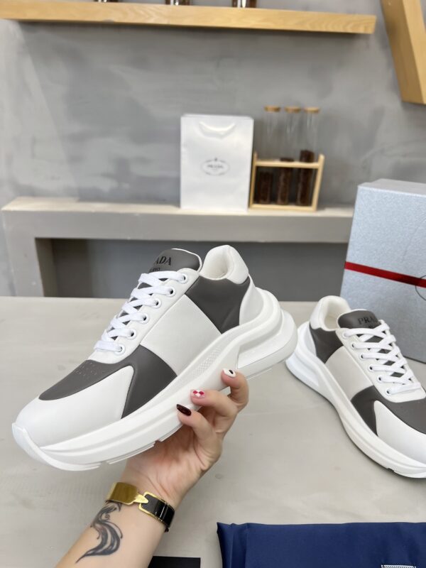 sy_no_D1F6D8B9B16A922686241214F2473B24_2 Prada Grey White Triangle Logo Platform Sneaker