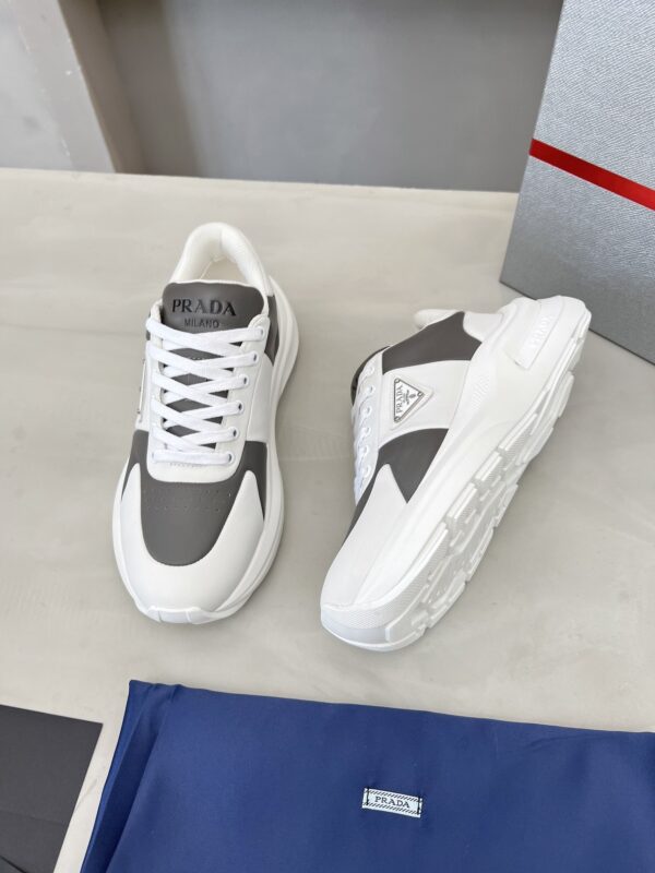 sy_no_D1F6D8B9B16A922686241214F2473B24_4 Prada Grey White Triangle Logo Platform Sneaker