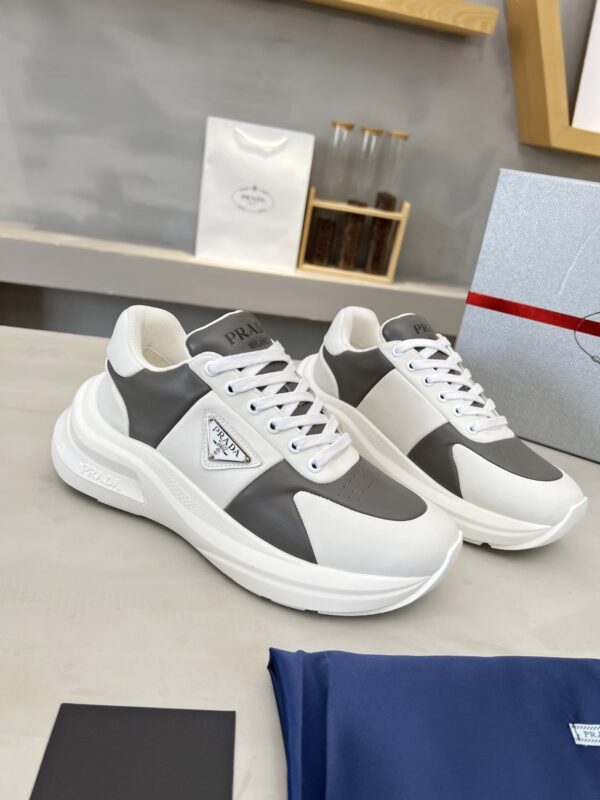 sy_no_D1F6D8B9B16A922686241214F2473B24_5 Prada Grey White Triangle Logo Platform Sneaker
