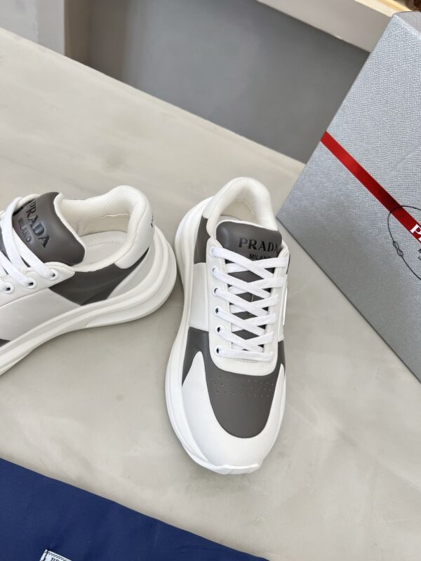 sy_no_D1F6D8B9B16A922686241214F2473B24_7 Prada Grey White Triangle Logo Platform Sneaker