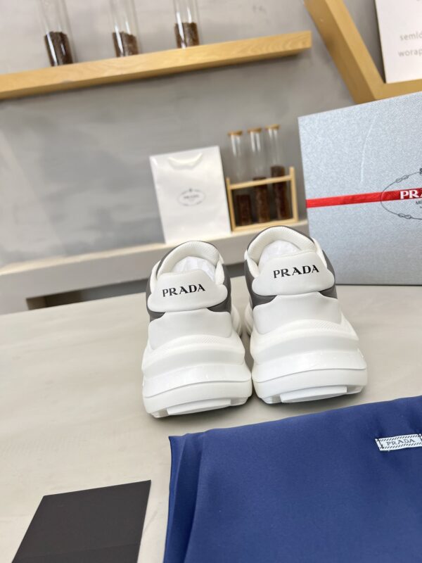 sy_no_D1F6D8B9B16A922686241214F2473B24_8 Prada Grey White Triangle Logo Platform Sneaker