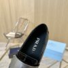 Prada Black Patent Metal Ring Pearl Block-Heel Loafer