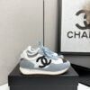 sy_no_D424E62A710CB81066D5EC9BBB4216D9_0 Chanel Light Blue and White Low-Top Sneaker with Suede Detailing and Black CC Logo