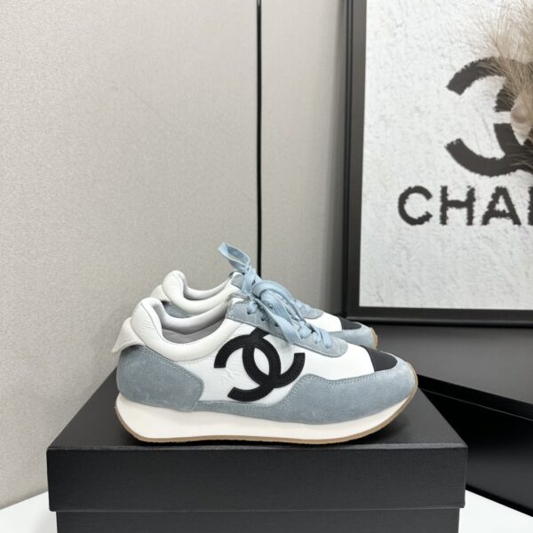 sy_no_D424E62A710CB81066D5EC9BBB4216D9_0 Chanel Light Blue and White Low-Top Sneaker with Suede Detailing and Black CC Logo