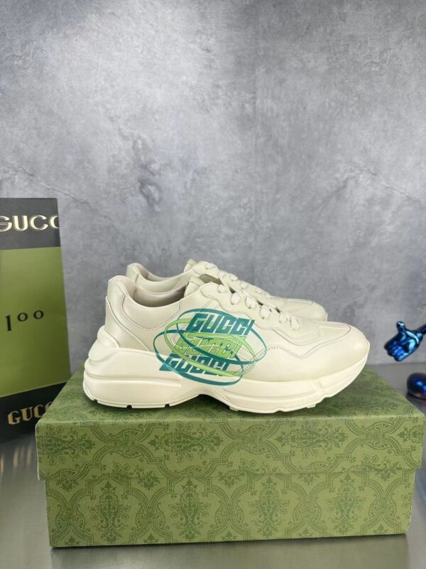 sy_no_D697672FD2C698AA7EF1D37EB1F6690D_0 Gucci Rhyton Oval Logo Sneaker in Off-White & Green