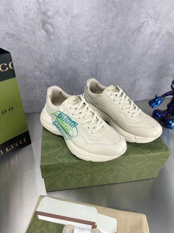 sy_no_D697672FD2C698AA7EF1D37EB1F6690D_2 Gucci Rhyton Oval Logo Sneaker in Off-White & Green