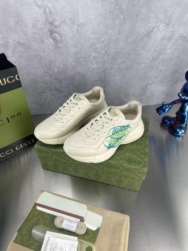 sy_no_D697672FD2C698AA7EF1D37EB1F6690D_3 Gucci Rhyton Oval Logo Sneaker in Off-White & Green