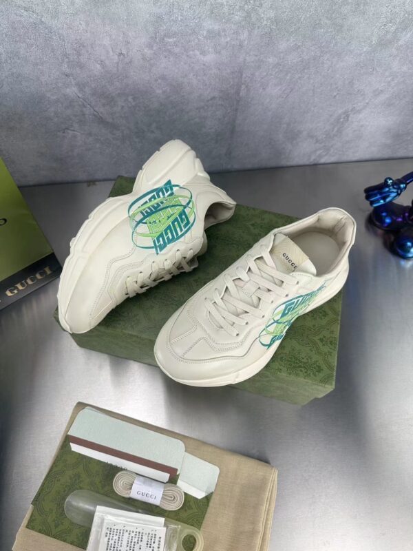 sy_no_D697672FD2C698AA7EF1D37EB1F6690D_7 Gucci Rhyton Oval Logo Sneaker in Off-White & Green