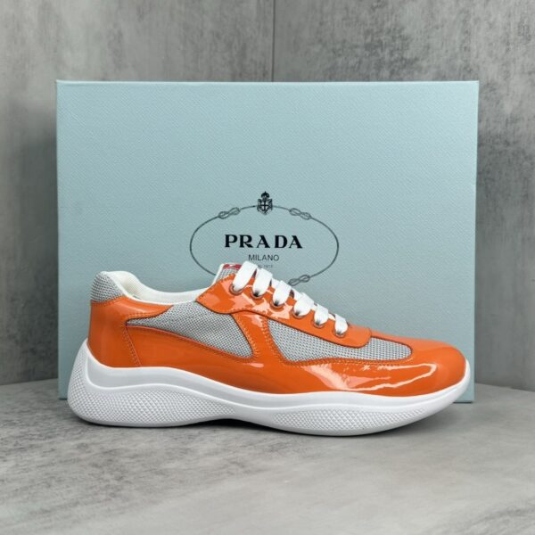 sy_no_D90EA8B549FAE975FDE79A1201CB9995_0 Prada America's Cup Orange Patent Mesh Sneaker