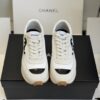 sy_no_DDE6F70509C357A7DC9D48E486735DAF_1 Chanel White and Grey Nylon and Suede Low-Top Sneaker with Black Toe Cap and CC Logo