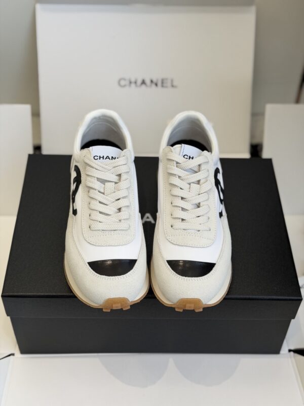 sy_no_DDE6F70509C357A7DC9D48E486735DAF_1 Chanel White and Grey Nylon and Suede Low-Top Sneaker with Black Toe Cap and CC Logo
