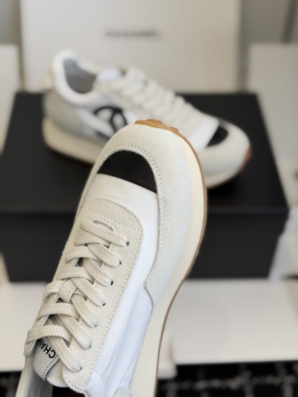 sy_no_DDE6F70509C357A7DC9D48E486735DAF_4 Chanel White and Grey Nylon and Suede Low-Top Sneaker with Black Toe Cap and CC Logo