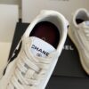 sy_no_DDE6F70509C357A7DC9D48E486735DAF_6 Chanel White and Grey Nylon and Suede Low-Top Sneaker with Black Toe Cap and CC Logo