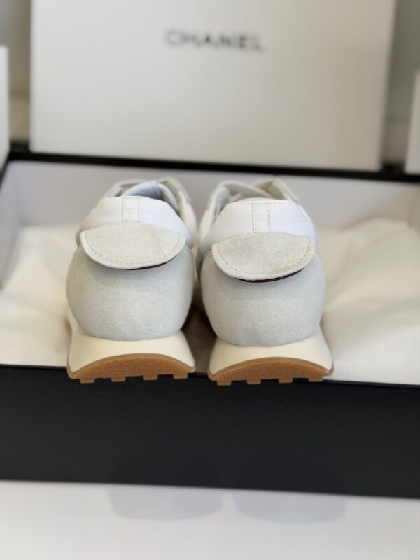 sy_no_DDE6F70509C357A7DC9D48E486735DAF_7 Chanel White and Grey Nylon and Suede Low-Top Sneaker with Black Toe Cap and CC Logo