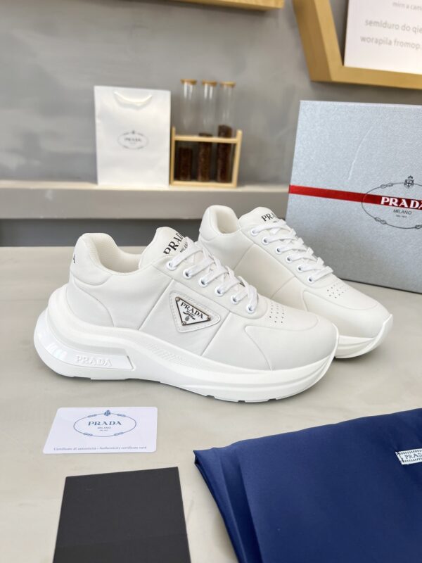 sy_no_E0D5A4917EB9C87270711D75751964BC_3 Prada White Triangle Logo Platform Sneaker
