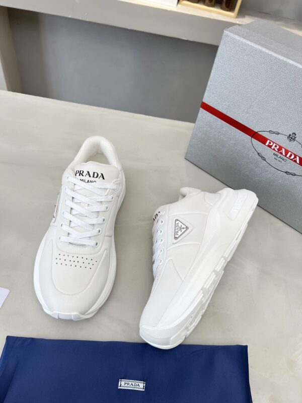 sy_no_E0D5A4917EB9C87270711D75751964BC_4 Prada White Triangle Logo Platform Sneaker