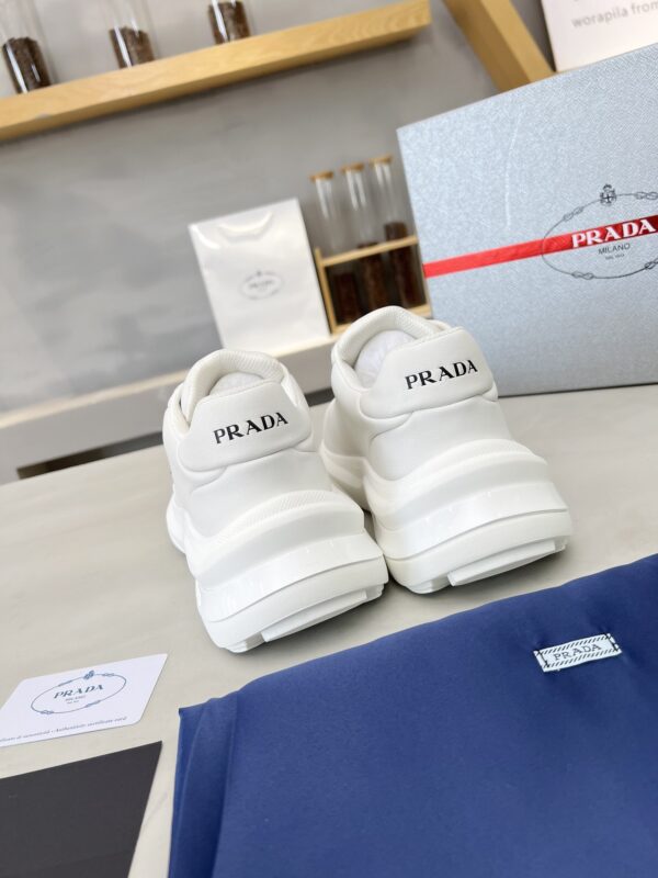 sy_no_E0D5A4917EB9C87270711D75751964BC_7 Prada White Triangle Logo Platform Sneaker