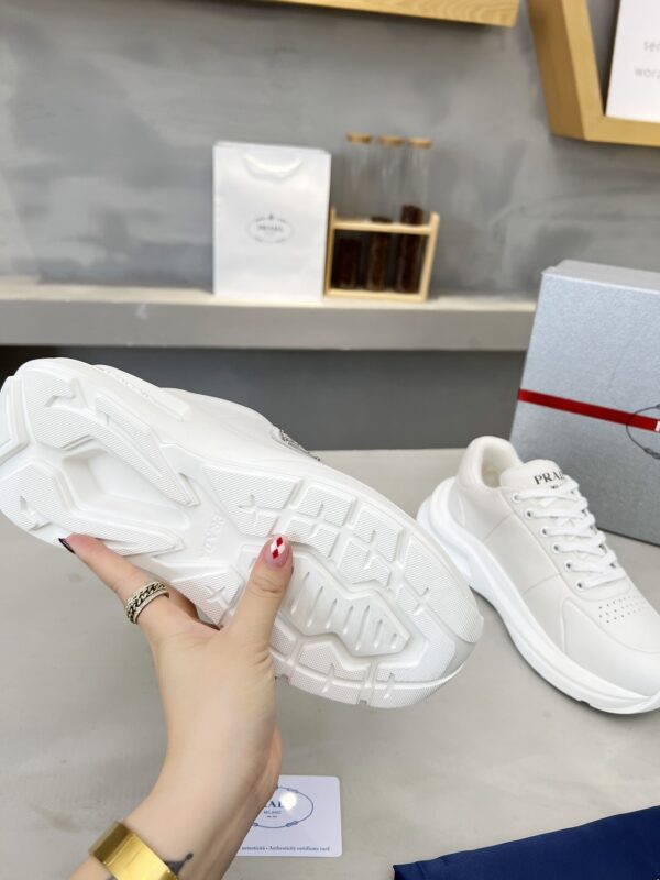 sy_no_E0D5A4917EB9C87270711D75751964BC_8 Prada White Triangle Logo Platform Sneaker