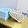 sy_no_E249A52934DC712A867AFA5CEC3A2A41_4 Prada Light Grey Pebbled Leather Retro Runner