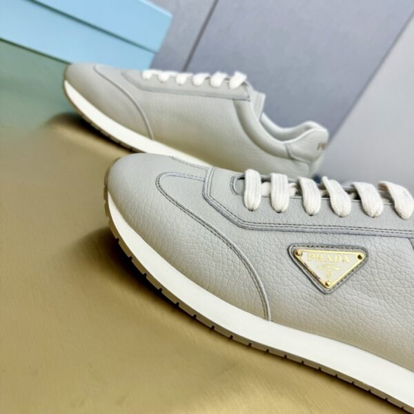sy_no_E249A52934DC712A867AFA5CEC3A2A41_7 Prada Light Grey Pebbled Leather Retro Runner