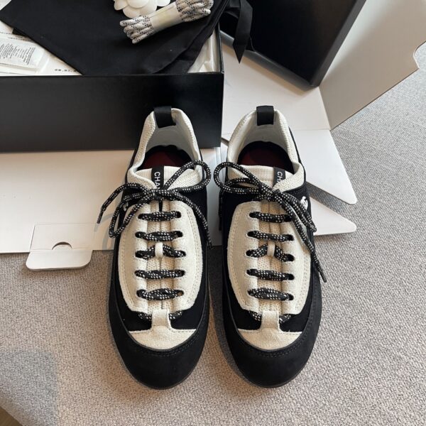 sy_no_E436F4017644242F837A7135DFD138F7_0 Chanel Black and White Suede and Fabric Low-Top Sneaker with Speckled Laces
