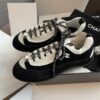 sy_no_E436F4017644242F837A7135DFD138F7_5 Chanel Black and White Suede and Fabric Low-Top Sneaker with Speckled Laces
