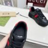 sy_no_E8AE8785DE69A5CB5CDE27786E519D94_7 Gucci Black Leather Chunky Sneaker with Red/Blue Web Stripe & Red Heel Detail
