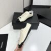 sy_no_EBE9D714E87BFE3714AEF0457AC9E1B2_2 Chanel Off-White and Black Patent Cap-Toe Low-Top Sneaker with CC Lace Lock