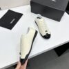 sy_no_EBE9D714E87BFE3714AEF0457AC9E1B2_8 Chanel Off-White and Black Patent Cap-Toe Low-Top Sneaker with CC Lace Lock