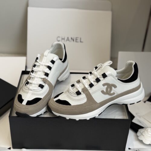 sy_no_EC081D71F35F0D9A4A96AA655C58141D_0 Chanel White and Khaki Mixed Material Low-Top Sneaker with Black Accents and CC Logo