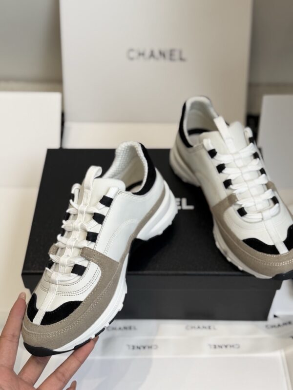 sy_no_EC081D71F35F0D9A4A96AA655C58141D_3 Chanel White and Khaki Mixed Material Low-Top Sneaker with Black Accents and CC Logo