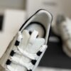 sy_no_EC081D71F35F0D9A4A96AA655C58141D_4 Chanel White and Khaki Mixed Material Low-Top Sneaker with Black Accents and CC Logo