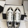 sy_no_EC081D71F35F0D9A4A96AA655C58141D_8 Chanel White and Khaki Mixed Material Low-Top Sneaker with Black Accents and CC Logo