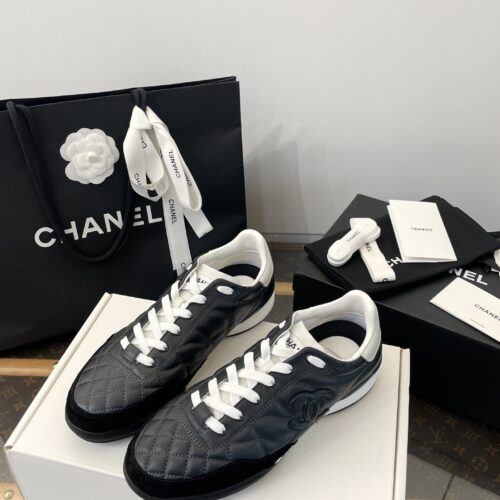 Chanel Black Quilted Leather Low-Top Sneaker with White Laces and CC Logo