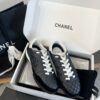 Chanel Black Quilted Leather Low-Top Sneaker with White Laces and CC Logo