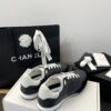 Chanel Black Quilted Leather Low-Top Sneaker with White Laces and CC Logo