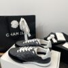 Chanel Black Quilted Leather Low-Top Sneaker with White Laces and CC Logo