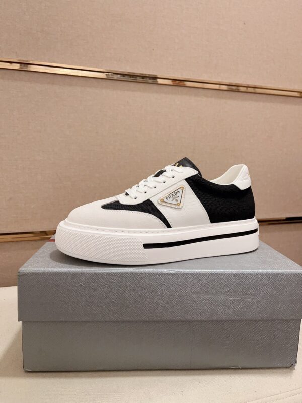 sy_no_F47DD46ABC08C92D9436AFD774E57810_0 Prada Black White Leather Mesh Triangle Platform Sneaker