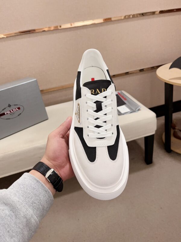 sy_no_F47DD46ABC08C92D9436AFD774E57810_1 Prada Black White Leather Mesh Triangle Platform Sneaker