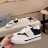 sy_no_F47DD46ABC08C92D9436AFD774E57810_2 Prada Black White Leather Mesh Triangle Platform Sneaker