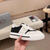 sy_no_F47DD46ABC08C92D9436AFD774E57810_3 Prada Black White Leather Mesh Triangle Platform Sneaker