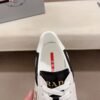 sy_no_F47DD46ABC08C92D9436AFD774E57810_5 Prada Black White Leather Mesh Triangle Platform Sneaker