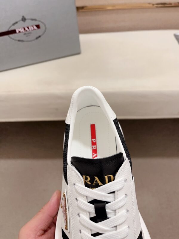 sy_no_F47DD46ABC08C92D9436AFD774E57810_5 Prada Black White Leather Mesh Triangle Platform Sneaker