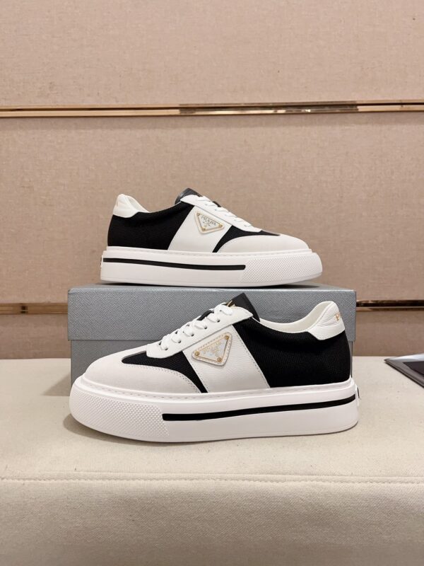 sy_no_F47DD46ABC08C92D9436AFD774E57810_6 Prada Black White Leather Mesh Triangle Platform Sneaker
