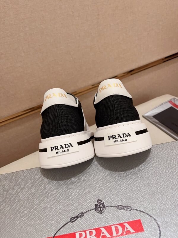 sy_no_F47DD46ABC08C92D9436AFD774E57810_7 Prada Black White Leather Mesh Triangle Platform Sneaker